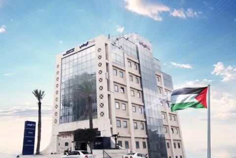 البنك الوطني يستحوذ على حصة من أسهم ’الإسلامي الفلسطيني’